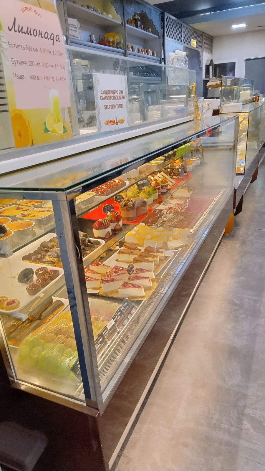Simit turkish 24/7 cake shop display counter full of Turkish desserts