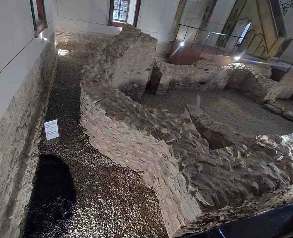 Apse of the Christian Church and signaling of Iron age cult pit